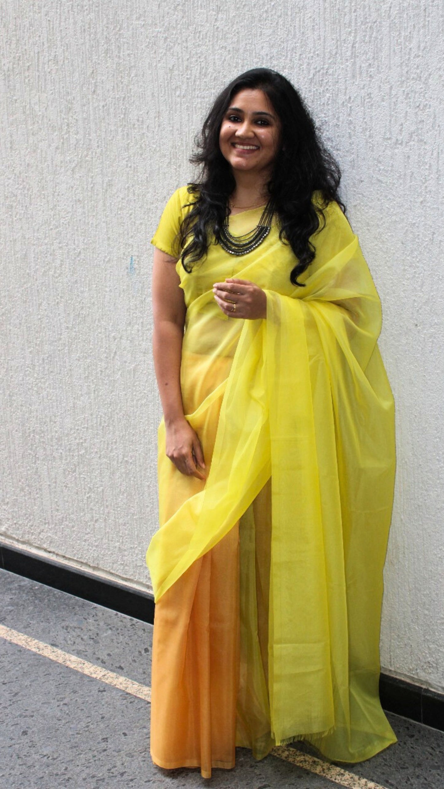 The fall hues - Banna's signature organza saree